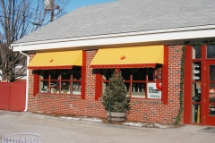 Yellow Store Window Awnings